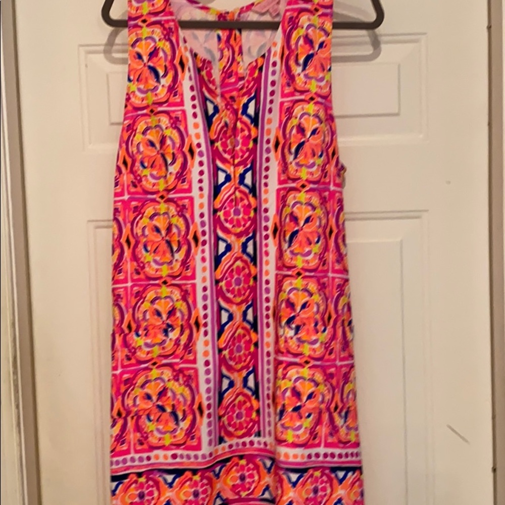 Lilly colorful sleeveless shift with pockets.